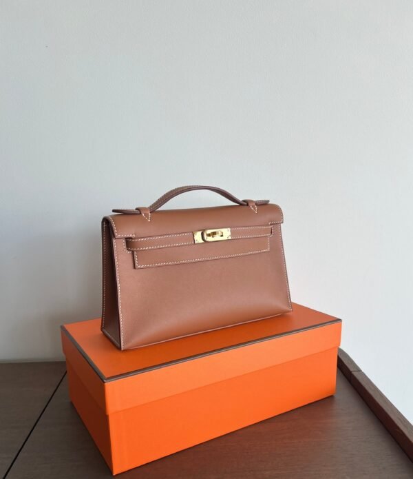 Herm√®s Kelly Pochette Gold Swift GHW